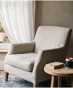 A chair positioned next to a small table